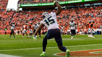 DENVER, CO - SEPTEMBER 9: Wide receiver Brandon Marshall #15 of the Seattle Seahawks celebrates after scoring a touchdown against the Denver Broncos in the third quarter of a game at Broncos Stadium at Mile High on September 9, 2018 in Denver, Colorado.   Dustin Bradford/Getty Images/AFP
 == FOR NEWSPAPERS, INTERNET, TELCOS &amp; TELEVISION USE ONLY ==