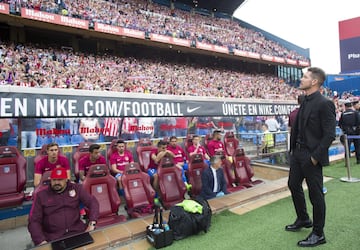 Simeone looks wistfully at the stand for one last time.