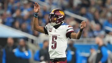 DETROIT, MICHIGAN - JANUARY 18: Jayden Daniels #5 of the Washington Commanders reacts during the fourth quarter against the Detroit Lions in the NFC Divisional Playoff at Ford Field on January 18, 2025 in Detroit, Michigan. Nic Antaya/Getty Images/AFP (Photo by Nic Antaya / GETTY IMAGES NORTH AMERICA / Getty Images via AFP)