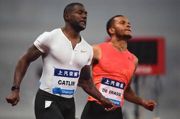 Justin Gatlin, junto a Andre de Grasse en los 100 metros de la Diamond League de Shanghai.