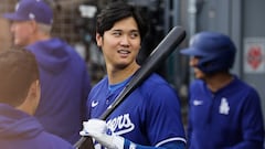 Los Angeles (United States), 24/03/2024.- Los Angeles Dodgers' Shohei Ohtani talks with teammates during the first inning of the exhibition game between the Los Angeles Dodgers and Los Angeles in Los Angeles, California, USA, on 24 March 2024. EFE/EPA/ALLISON DINNER
