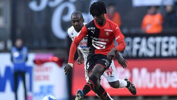 Amiens' Congolese forward Gael Kakuta (L) vies for the ball with Rennes' French midfielder Eduardo Camavinga during the French L1 football match between Stade Rennais Football Club and SC Amiens, on November 10, 2019, at the Roazhon Park, in Ren