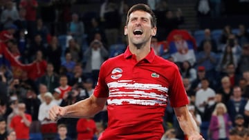 Tennis - ATP Cup - Ken Rosewall Arena, Sydney, Australia - January 13, 2020  Serbia&#039;s Novak Djokovic celebrates winning the ATP Cup after winning his Final doubles match against Spain&#039;s Pablo Carreno-Busta and Feliciano Lopez  REUTERS/Ciro De Luca