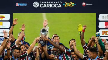 RIO DE JANEIRO, BRAZIL - JULY 08: Players of Fluminense lift the trophy after defeating Flamengo as part of the Taca Rio, the Second Leg of the Carioca State Championship at Maracana Stadium on July 8, 2020 in Rio de Janeiro, Brazil. The match is played b