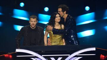 TURIN, ITALY - MAY 14: Alessandro Cattelan, Laura Pausini and Mika are seen on stage during the Grand Final show of the 66th Eurovision Song Contest at Pala Alpitour on May 14, 2022 in Turin, Italy. (Photo by Giorgio Perottino/Getty Images)