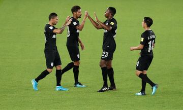 Soccer Football - FIFA Club World Cup Third Place Match - Al Jazira vs CF Pachuca - Zayed Sports City Stadium, Abu Dhabi, United Arab Emirates - December 16, 2017   Pachuca's Jonathan Urretaviscaya celebrates scoring their first goal with Oscar Murillo an