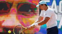 SANTIAGO, CHILE - MARCH 14: Facundo Bagnis of Argentina plays a backhand against Cristian Garin of Chile during the final of Chile Dove Men+Care Open at Club Deportivo Universidad Catolica on March 14, 2021 in Santiago, Chile. (Photo by Marcelo Hernandez/