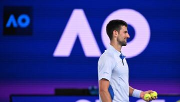 Serbia's Novak Djokovic looks on between points against Croatia's Dino Prizmic during their men's singles match on day one of the Australian Open tennis tournament in Melbourne on January 14, 2024. (Photo by WILLIAM WEST / AFP) / -- IMAGE RESTRICTED TO EDITORIAL USE - STRICTLY NO COMMERCIAL USE --