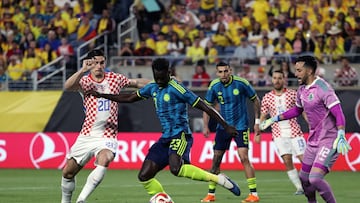 ORLANDO, FLORIDA - MARCH 26: Davinson S�nchez of Colombia shoots against Igor Matanovic of Croatia during the international friendly match between Colombia and Croatia at Camping World Stadium on March 26, 2026 in Orlando, Florida. Leonardo Fernandez/Getty Images/AFP (Photo by Leonardo Fernandez / GETTY IMAGES NORTH AMERICA / Getty Images via AFP)
