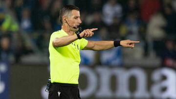 KRAKOW, POLAND - SEPTEMBER 27: Referee Tasos Sidiropoulos (R) reverses his decision to award Scotland a penalty during a UEFA Nations League match between Ukraine and Scotland at the Stadion Cracovii im. Jozefa Pilsudskiego, on September 27, 2022, in Krakow, Poland. (Photo by Craig Williamson/SNS Group via Getty Images)