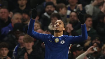 Chelsea's Brazilian striker #20 Joao Pedro celebrates after scoring the opening goal during the English Premier League football match between Chelsea and Leeds United at Stamford Bridge in London on February 10, 2026. (Photo by Adrian Dennis / AFP) / RESTRICTED TO EDITORIAL USE. No use with unauthorized audio, video, data, fixture lists, club/league logos or 'live' services. Online in-match use limited to 120 images. An additional 40 images may be used in extra time. No video emulation. Social media in-match use limited to 120 images. An additional 40 images may be used in extra time. No use in betting publications, games or single club/league/player publications. /