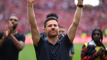 (FILES) Bayer Leverkusen's Spanish head coach Xabi Alonso reacts after the German first division Bundesliga football match between Mainz 05 and Bayer Leverkusen in Mainz, western Germany on May 17, 2025. Real Madrid announced in a statement on May 25, 2025, that Xabi Alonso has been appointed the new coach of Real Madrid with the Spaniard to take over from June 1, and lead the team at the Club World Cup. "Xabi Alonso will be the Real Madrid coach for the next three seasons, from June 1, 2025 until June 30, 2028,". Alonso succeeds Carlo Ancelotti, who has taken over as Brazil national coach. (Photo by Kirill KUDRYAVTSEV / AFP) / DFL REGULATIONS PROHIBIT ANY USE OF PHOTOGRAPHS AS IMAGE SEQUENCES AND/OR QUASI-VIDEO