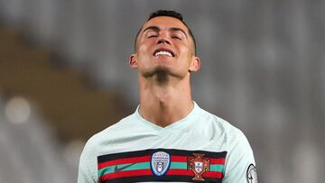 BELGRADE, SERBIA - MARCH 27: Cristiano Ronaldo of Portugal  reacts  during the FIFA World Cup 2022 Qatar qualifying match between Serbia and Portugal at FK Crvena Zvezda stadium on March 27, 2021 in Belgrade, Serbia. Sporting stadiums around Serbia remain under strict restrictions due to the Coronavirus Pandemic as Government social distancing laws prohibit fans inside venues resulting in games being played behind closed doors.  (Photo by Srdjan Stevanovic/Getty Images)