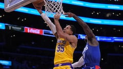 Oct 20, 2022; Los Angeles, California, USA; Los Angeles Lakers forward Juan Toscano-Anderson (95) shoots the ball against LA Clippers guard John Wall (11) in the first half at Crypto.com Arena. Mandatory Credit: Kirby Lee-USA TODAY Sports