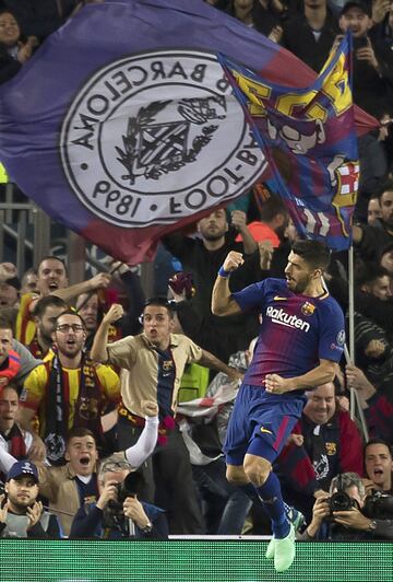 Luis Suárez celebrates after scoring.