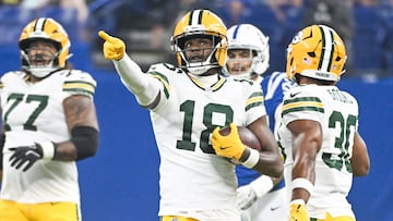 Aug 16, 2025; Indianapolis, Indiana, USA; Green Bay Packers wide receiver Malik Heath (18) celebrates after a first down during the first half against the Indianapolis Colts at Lucas Oil Stadium. Mandatory Credit: Robert Goddin-Imagn Images