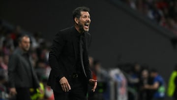 Atletico Madrid's Argentine coach Diego Simeone shouts instructions to players during the UEFA Champions League quarter final second leg football match between Club Atletico de Madrid and FC Barcelona at Metropolitano Stadium in Madrid on April 14, 2026. (Photo by Javier SORIANO / AFP)