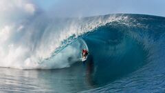 Kelly Slater of Cocoa Beach, Florida, USA (pictured) rides an enormous barrel at Teahupo'o during Round 1 of the Billabong Pro Tahiti on Monday August 18, 2014. Slater posted a near perfect 9.40 ride (out of a possible ten) and has advanced into Round 3.