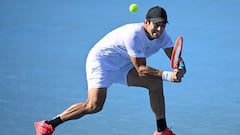 Cristian Garin of Chile hits a return in the final game against Sho Shimabukuro of Japan in their men�s singles match on day two of the ATP Japan Open tennis tournament in Tokyo on October 17, 2023. (Photo by Richard A. Brooks / AFP)