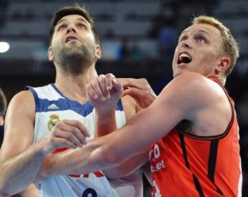 Real Madrid's Felipe Reyes jostles with Valencia Basket's Luke Sikma