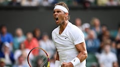 Spain's Rafael Nadal celebrates as he plays against Argentina's Francisco Cerundolo during their men's singles tennis match on the second day of the 2022 Wimbledon Championships at The All England Tennis Club in Wimbledon, southwest London, on June 28, 2022. (Photo by Glyn KIRK / AFP) / RESTRICTED TO EDITORIAL USE