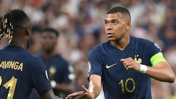 France's forward Kylian Mbappe (R) reacts during the UEFA Euro 2024 group B qualification football match between France and Greece at the Stade de France in Saint-Denis, in the northern outskirts of Paris, on June 19, 2023. (Photo by FRANCK FIFE / AFP)