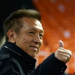 Peter Lim sonríe junto a Cristiano Ronaldo