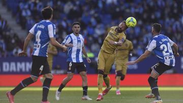 BARCELONA, SPAIN - DECEMBER 11: Jose Luis Morales of Levante is challenged by Manu Morlanes and Sergi Gomez of Espanyol during the La Liga Santander match between RCD Espanyol and Levante UD at RCDE Stadium on December 11, 2021 in Barcelona, Spain. (Photo