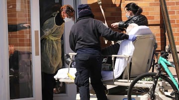 NEW YORK, NY - APRIL 02: Medical workers bring in a patient at a special coronavirus intake area at Maimonides Medical Center which has seen an upsurge of patients on April 02, 2020 in Borough Park section of Brooklyn in New York City. Hospitals in New Yo