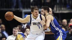 Jan 13, 2019; Dallas, TX, USA; Dallas Mavericks guard Luka Doncic (77) dribbles as  Golden State Warriors guard Klay Thompson (11) defends during the second half at American Airlines Center. Mandatory Credit: Kevin Jairaj-USA TODAY Sports