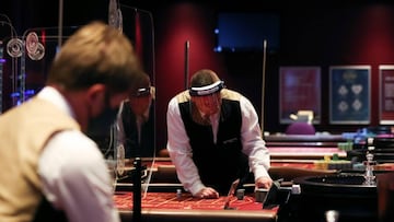 Staff members work before the reopening of Grosvenor Casino on St James' Blvd on August 1, after lockdown due to the outbreak of the coronavirus disease (COVID-19), in Newcastle upon Tyne, Britain July 31, 2020. REUTERS/Lee Smith