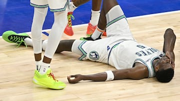 MINNEAPOLIS, MINNESOTA - MAY 22: Anthony Edwards #5 of the Minnesota Timberwolves lies on the court after being hit during the second quarter against the Dallas Mavericks in Game One of the Western Conference Finals at Target Center on May 22, 2024 in Minneapolis, Minnesota. NOTE TO USER: User expressly acknowledges and agrees that, by downloading and or using this photograph, User is consenting to the terms and conditions of the Getty Images License Agreement. Stephen Maturen/Getty Images/AFP (Photo by Stephen Maturen / GETTY IMAGES NORTH AMERICA / Getty Images via AFP)