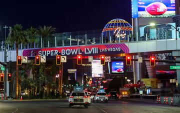 LAS VEGAS, NEVADA - JANUARY 30: Signage for Super Bowl LVIII is displayed on a pedestrian bridge on the Las Vegas Strip on January 30, 2024 in Las Vegas, Nevada. The game will be played on February 11, 2024, between the Kansas City Chiefs and the San Francisco 49ers at Allegiant Stadium.   Ethan Miller/Getty Images/AFP (Photo by Ethan Miller / GETTY IMAGES NORTH AMERICA / Getty Images via AFP)