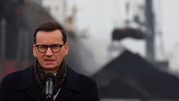 Polish Prime Minister Mateusz Morawiecki talks during a briefing at the coal storage in Port Gdanski Eksploatacja, Gdansk, Poland, December 5, 2022. REUTERS/Kacper Pempel