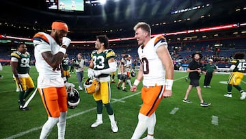 DENVER, COLORADO - AUGUST 18: Troy Franklin #16 and Bo Nix #10 of the Denver Broncos talk with Evan Williams #33 of the Green Bay Packers following the preseason game at Empower Field At Mile High on August 18, 2024 in Denver, Colorado. Tyler Schank/Getty Images/AFP (Photo by Tyler Schank / GETTY IMAGES NORTH AMERICA / Getty Images via AFP)