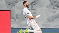 Real Madrid&#039;s French forward Karim Benzema celebrates after scoring during the &quot;El Clasico&quot; Spanish League football match between Real Madrid CF and FC Barcelona at the Alfredo di Stefano stadium in Valdebebas, on the outskirts of Madrid on