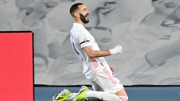 Real Madrid's French forward Karim Benzema celebrates after scoring during the "El Clasico" Spanish League football match between Real Madrid CF and FC Barcelona at the Alfredo di Stefano stadium in Valdebebas, on the outskirts of Madrid on