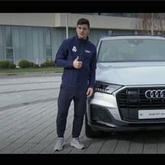 Real Madrid players pose for the cameras with their new club cars