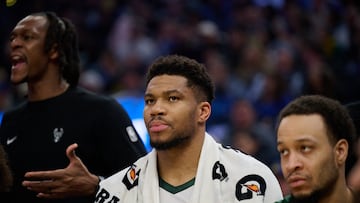 Milwaukee Bucks forward Giannis Antetokounmpo (34) looks on from the bench against the Golden State Warriors during the second quarter at Chase Center.