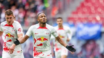 01 October 2022, Saxony, Leipzig: Soccer: Bundesliga, Matchday 8, RB Leipzig - VfL Bochum at the Red Bull Arena. Leipzig's Christopher Nkunku (r) and Willi Orban celebrate after the 2:0 penalty kick. Photo: Jan Woitas/dpa - IMPORTANT NOTE: In accordance with the requirements of the DFL Deutsche Fußball Liga and the DFB Deutscher Fußball-Bund, it is prohibited to use or have used photographs taken in the stadium and/or of the match in the form of sequence pictures and/or video-like photo series. (Photo by Jan Woitas/picture alliance via Getty Images)