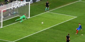 Griezmann buries the penalty to put France ahead.