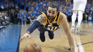 OKLAHOMA CITY, OK - APRIL 15: Ricky Rubio #3 of the Utah Jazz dives for the ball after stealing it away from Carmelo Anthony of the Oklahoma City Thunder during the second half of Game 1 of the NBA Western Conference playoffs at the Chesapeake Energy Arena on April 15, 2018 in Oklahoma City, Oklahoma. NOTE TO USER: User expressly acknowledges and agrees that, by downloading and or using this photograph, User is consenting to the terms and conditions of the Getty Images License Agreement.   J Pat Carter/Getty Images/AFP
 == FOR NEWSPAPERS, INTERNET, TELCOS &amp; TELEVISION USE ONLY ==