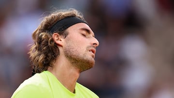 Greece's Stefanos Tsitsipas reacts during his men's singles match against Italy's Matteo Gigante on day 4 of the French Open tennis tournament on Court Simonne-Mathieu at the Roland-Garros Complex in Paris on May 28, 2025. (Photo by Anne-Christine POUJOULAT / AFP)
