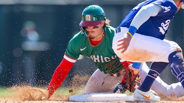 Mar 4, 2026; Glendale, AZ, USA; Team Mexico outfielder Jarren Duran slides into second with a stolen base against the Los Angeles Dodgers during a spring training game at Camelback Ranch. Mandatory Credit: Mark J. Rebilas-Imagn Images
