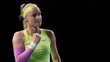 Slovakia's Rebecca Sramkova reacts as she plays against Australia's Ajla Tomljanovic during their quarter-finals singles tennis match between Australia and Slovakia at the Billie Jean King Cup Finals at the Palacio de Deportes Jose Maria Martin Carpena in Malaga, southern Spain, on November 17, 2024. (Photo by JORGE GUERRERO / AFP)