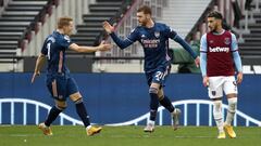 LONDON, ENGLAND - MARCH 21: Calum Chambers of Arsenal celebrates his side&#039;s second goal with Martin Odegaard during the Premier League match between West Ham United and Arsenal at London Stadium on March 21, 2021 in London, England. Sporting stadiums