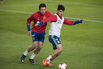 Carlos Soler shields the ball from Mikel Oyarzabal in Spain's U21 training session last week