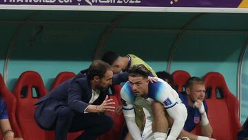 Soccer Football - FIFA World Cup Qatar 2022 - Group B - England v United States - Al Bayt Stadium, Al Khor, Qatar - November 25, 2022 England manager Gareth Southgate speaks to Jack Grealish before he come on as a substitute REUTERS/Paul Childs