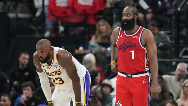 Dec 20, 2025; Inglewood, California, USA; Los Angeles Lakers forward Lebron James (23) and LA Clippers guard James Harden (1) react in the first half at Intuit Dome. Mandatory Credit: Kirby Lee-Imagn Images