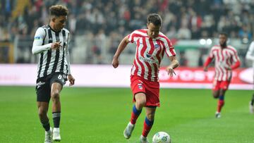 ISTANBUL, TURKEY - APRIL 12: Gedson Fernandes (L) of Besiktas and Sergio Reguilon (R) of Atletico Madrid battle for the ball during the Friendly match between Besiktas and Atletico Madrid at Vodafone Park on April 12, 2023 in Istanbul, Turkey. (Photo by Seskim Photo/MB Media/Getty Images)